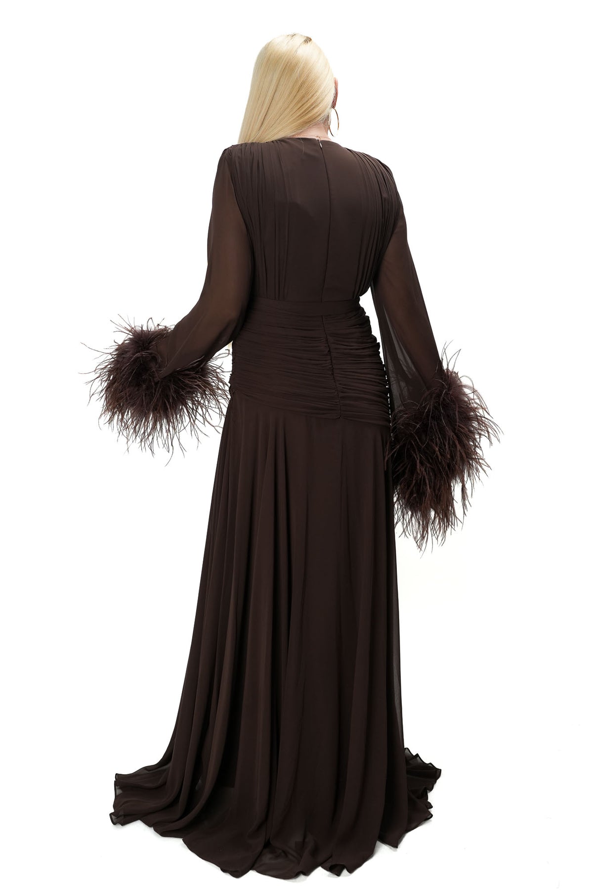 Elegant flared brown tulle gown with dramatic feather sleeves and high leg slit