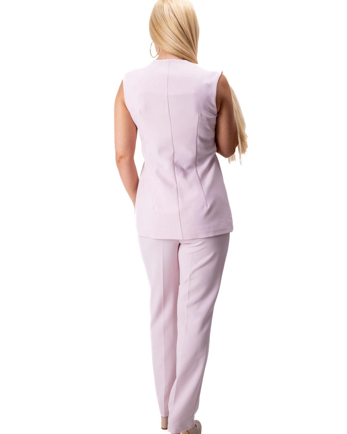women pink two piece suit with long vest and trousers