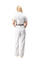 white beige linen women outfit wide pants elegant summer style