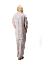 beige casual women outfit wide leg pants short sleeve shirt