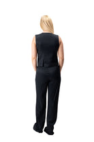 women two piece suit with cropped vest and wide leg striped black trousers 21242220