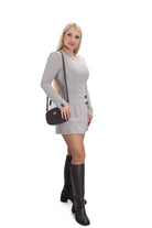 Бежов дамски гащеризон с къс пола-панталон и дълъг ръкав